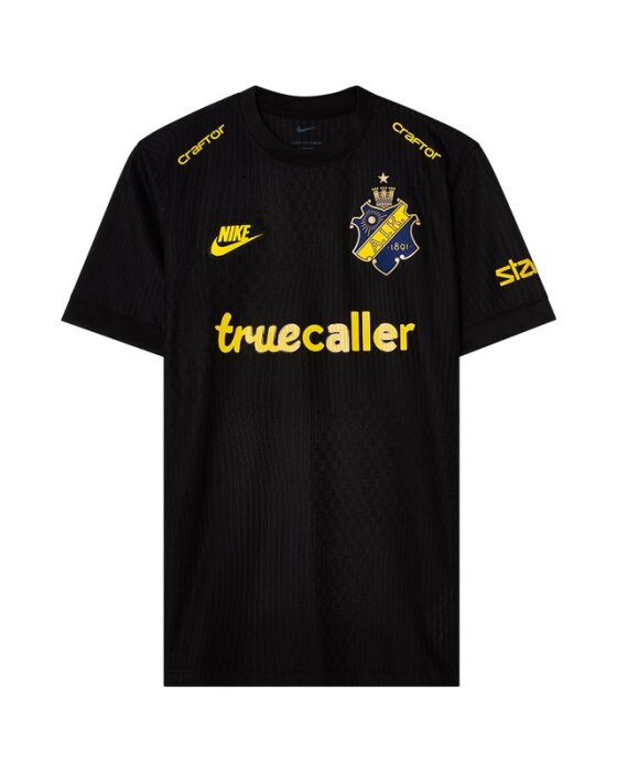 Svart fotbollströja med AIK-logga, Nike-märke och sponsorloggor i gult, inklusive Truecaller, Craford och sjz.