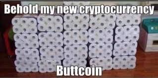 Rader av toalettpappersrullar staplade med texten "Behold my new cryptocurrency Buttcoin.