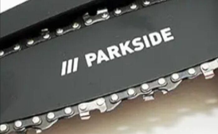 Motorsågkedja med texten "PARKSIDE" på svärdet.