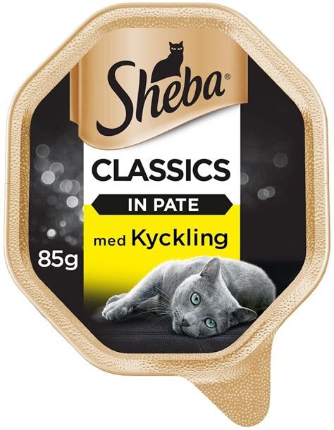 Förpackning av Sheba kattmat, Classic Pate med kyckling, 85g, med bild av en grå katt och texten "CLASSICS IN PATE med Kyckling".
