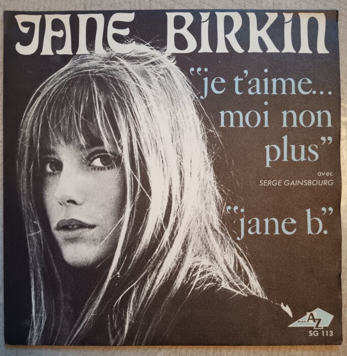 Omslag av musikskiva med texten "Jane Birkin", "je t'aime... moi non plus" och "jane b.", svartvitt fotografi av en kvinna med långt hår.
