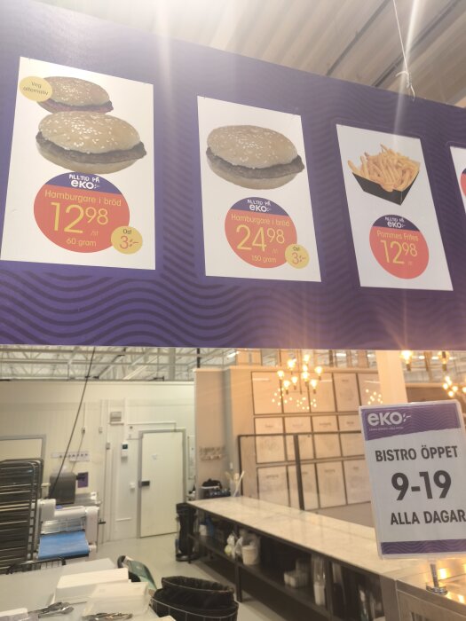 Affisch på Eko som visar pris på hamburgare och pommes frites, samt en skylt om bistroöppetider.