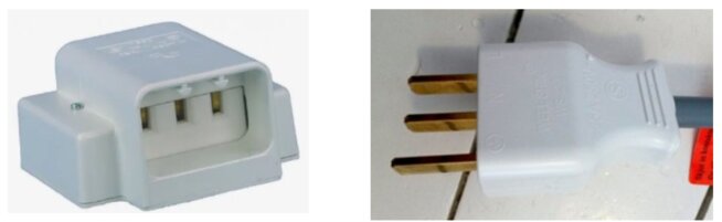 Närbild av två olika Perilex-kontakter; en vägguttag och en anslutningspropp, båda gjorda av vit plast med metallpinnar.