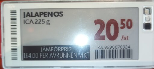 Prisskylt för ICA:s jalapenos 225 g, 20,50 kr/st. Jämförpris 164,00 kr per avrunnen vikt, med streckkod.