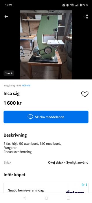 Grön bandsåg av märket Inca i träverkstad, står på bord.