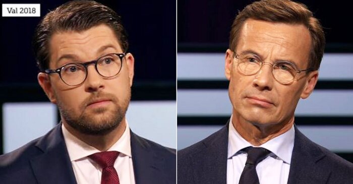 Två män i kostym och glasögon står bredvid varandra. Container med text "Val 2018" syns i bilden.