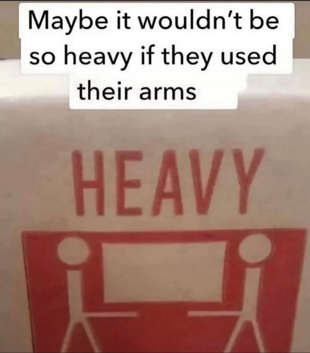 Två stiliserade figurer bär en tung låda med texten "HEAVY" och en humoristisk anmärkning om att använda armarna för att minska vikten.