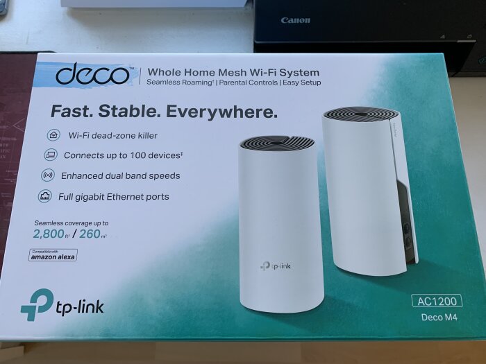 TP-Links Deco M4 mesh Wi-Fi-system i originalförpackning, främjar stabil och bred trådlös täckning för upp till 100 enheter.
