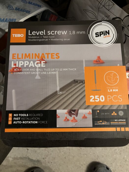 Förpackning av TEBO nivåskruvar 1,8 mm, 250 st. för plattsättning utan verktyg. Eliminerar nivåskillnader och möjliggör snabb installation.