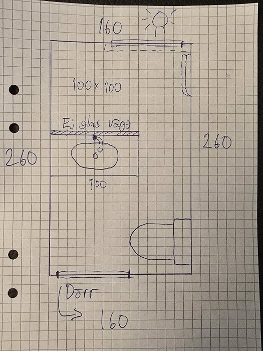 Ritning av badrum med duschområde, glasvägg markerad, handfat, dörr och plats för bänkskiva och toalett, skalenligt på rutat papper.
