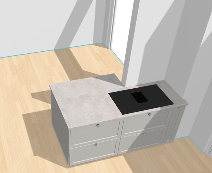 Köksö med inbyggd häll och fläkt, placerad mot en vit vägg på ljus trägolv.