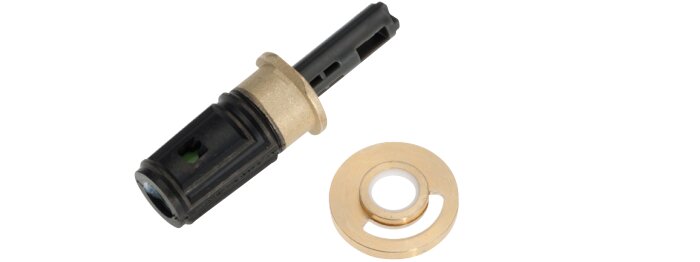 Två byggdelar: en svart sensor med metallfäste och en beige plastring med öppet spårfält.