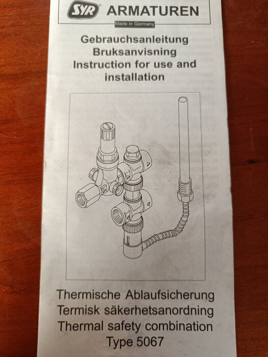 Bruksanvisning för termisk säkerhetsanordning, typ 5067, med instruktioner på tyska, svenska och engelska, samt ritning av ventilsystemet.