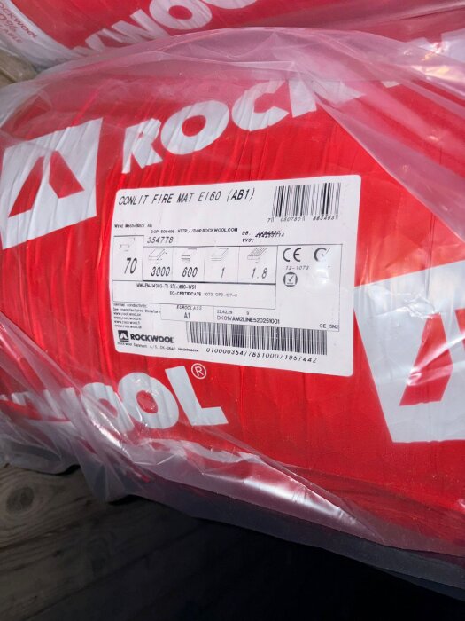 En förpackning Rockwool Conlit Fire Mat E160 med information om tjocklek 70 mm, längd 3000 mm och bredd 600 mm.
