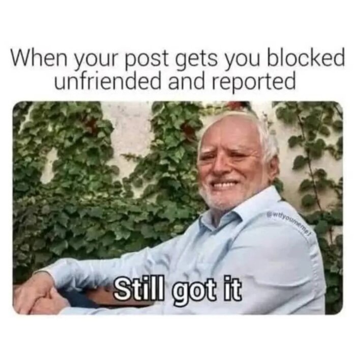 Äldre man ler framför en klättervägg, text ovanför: 'When your post gets you blocked unfriended and reported', text nedanför: 'Still got it'.