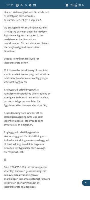 Text från en lagproposition på en mobilskärm som handlar om bygglov för komplementbostäder inom totalförsvarets påverkansområde.