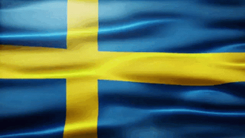 Svenska flaggan vajar i vinden.