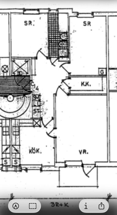 Planritning av en lägenhet med markerade väggar; kök (KÖK), vardagsrum (VR) och områden markerade som möjliga bärande väggar.