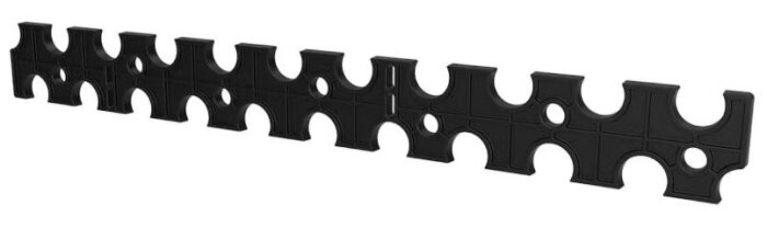 Svart plastfäste för rörböjar, med flera rundade öppningar och hål för montering, används för att fixera golvvärmeslingor i träreglar.