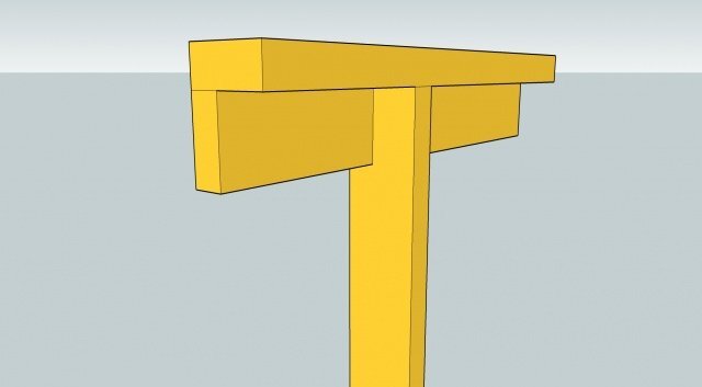 Träkonstruktion med en liggande och en stående regel 145x45 ovanpå en vertikal regel som används i garagetakstomme.