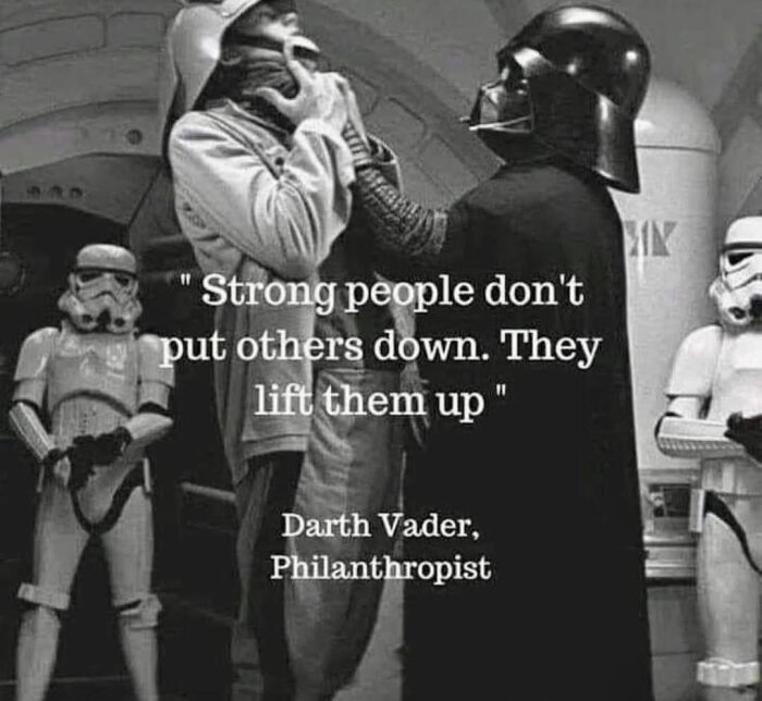 Star Wars-karaktär i svart dräkt lyfter en annan karaktär mot väggen med citatet "Strong people don't put others down. They lift them up.