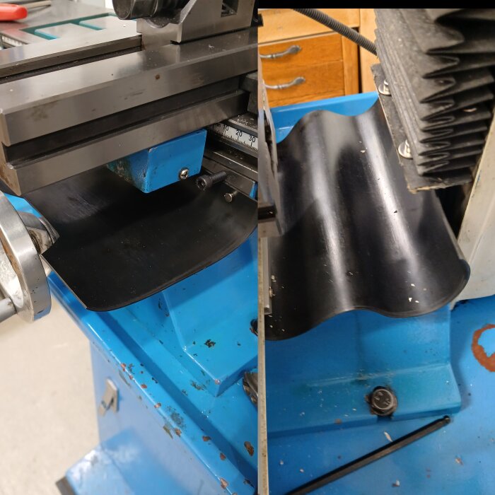 Närbild av en fräsmaskin i ett garage, försedd med svarta skydd av 1 mm gummiduk för gejderna på det blå bordet.