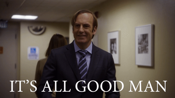 Man i kostym går i korridor med texten "IT'S ALL GOOD MAN" över bilden.