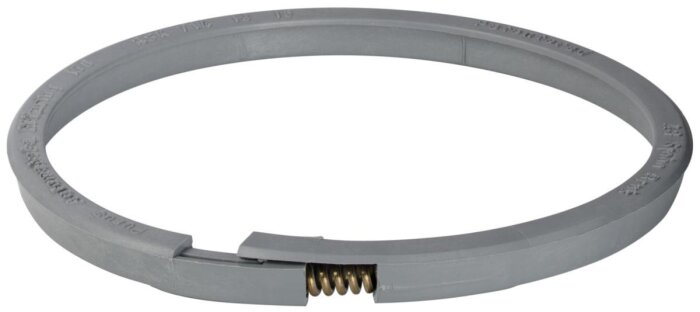 Grå klämring med fjäder, kan variera i omkretsen.