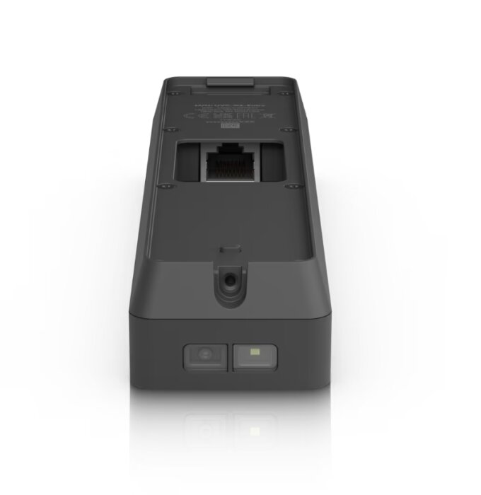 Svart enhet med nätverksport och hål för kabelanslutning, sedd bakifrån.