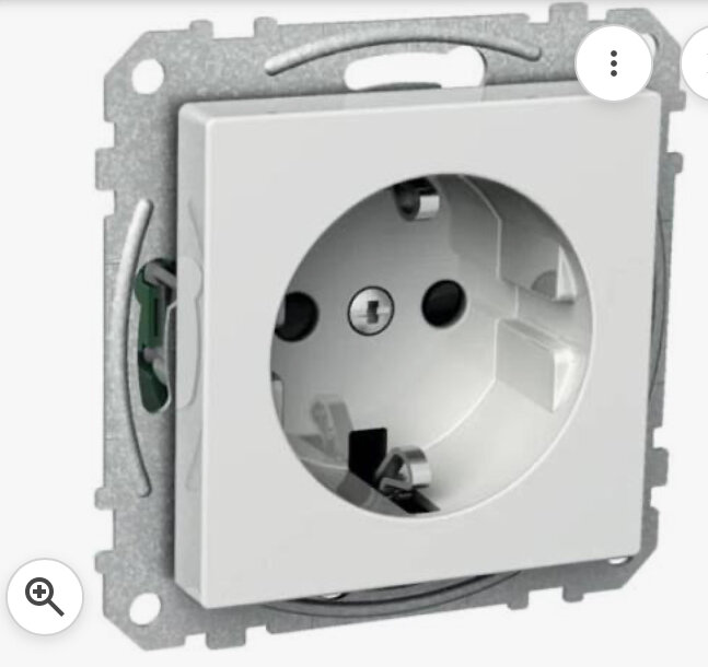 Infällt eluttag med grå ram, visar hur uttagsbrunnen kan placeras i väggen med minimal utskjutning.