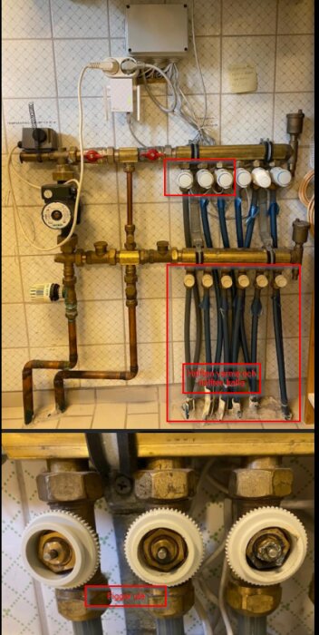 Fördelningsrör för vattenburen golvvärme med slangar, där vissa är kalla och vissa varma, samt ställdon vars piggar sticker ut.