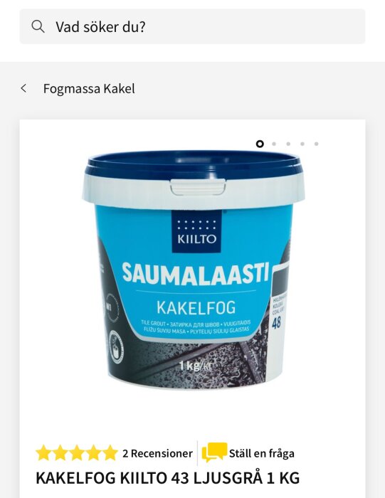 Burk med Kiilto kakelfog, ljusgrå 1 kg, märkt “Saumalaasti”. För användning i fogning av kakel.