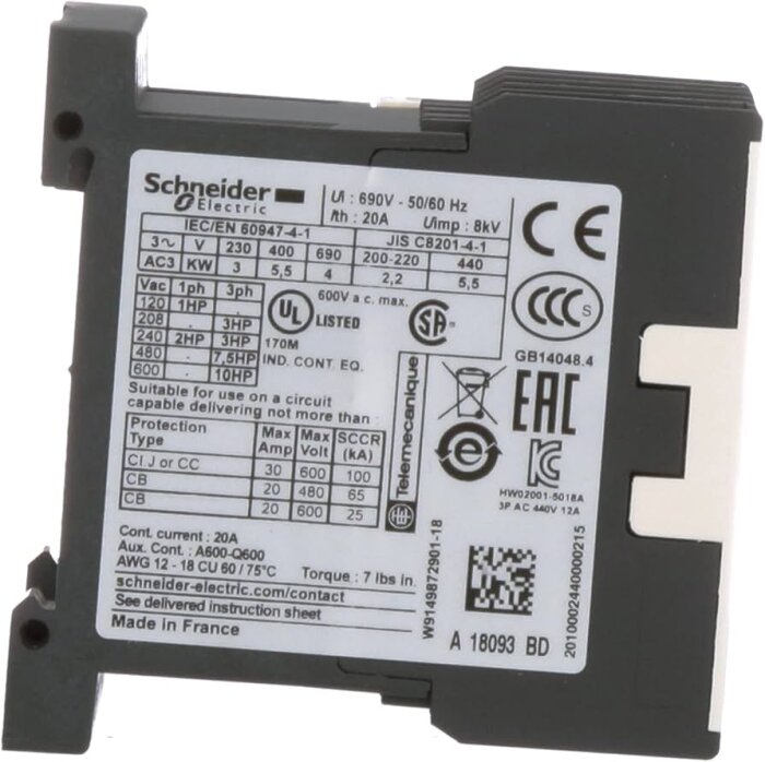 Närbild av en kontaktor från Schneider Electric med specifikationer för spänning, ström och effekt i hästkrafter (hp) angivna på märkskylten.