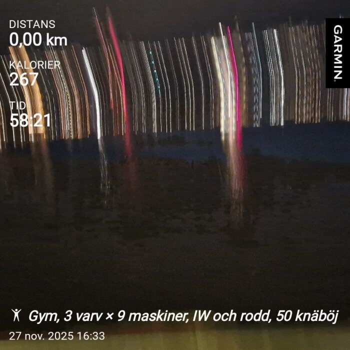 En suddig bild från en Garmin-träningsapp som visar 0 km, 267 kalorier, tid 58:21. Text om gymträning nedan.