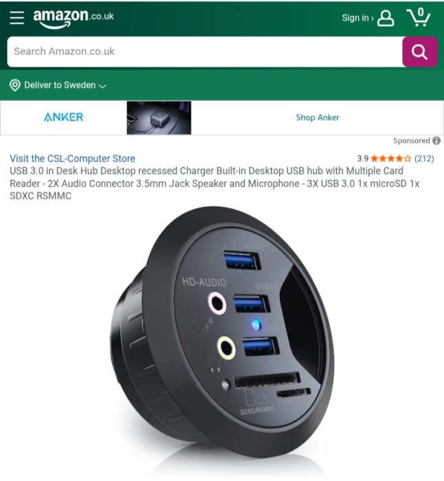 Inbyggt skrivbordshubb med USB 3.0-portar, ljudkontakter och kortplats, visad på en Amazon-produktlista.