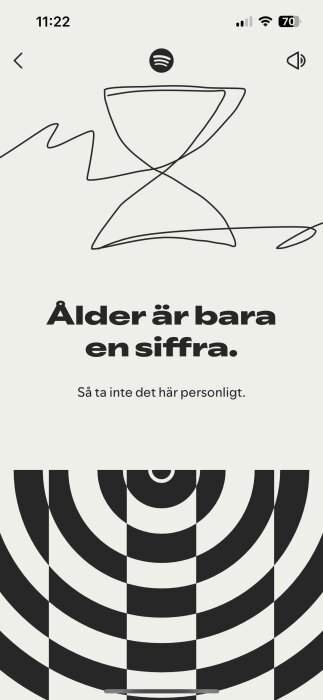 Spotify wrapped-skärm med texten 'Ålder är bara en siffra. Så ta inte det här personligt' och abstrakt design.