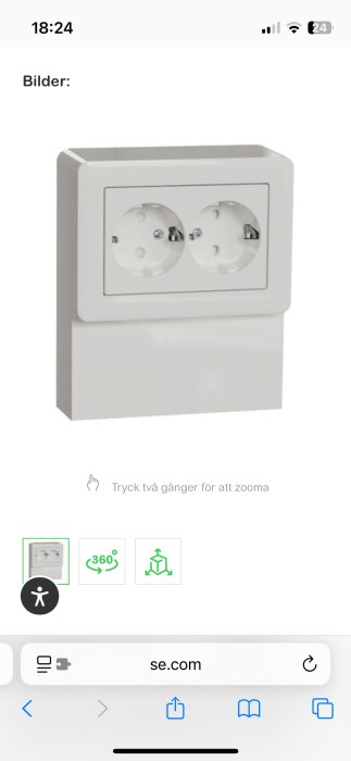 Vägguttag med två eluttag och en rektangulär sockeldosa i vit plast.