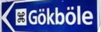Vägskylt med texten "Gökböle" och symbolen för sevärdhet.