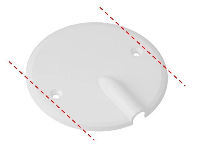 Vit plastlock med två skruvhål och en utstående del, markerad med röda diagonala streck som indikerar två kaplinjer.