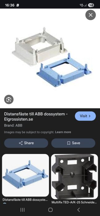 Två distansfästen för ABB-dossystem i vitt och blått visas på bilden.