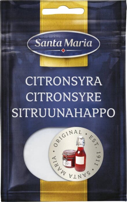 Påsen visar Santa Maria citronsyra för matlagning med etikett på engelska, svenska och finska.