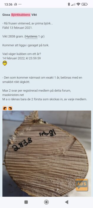 Närbild av en tvärsnittsbild av en björkkubbe, med märkningen "2838" och datumet "Feb-21" skrivet med svart tusch.