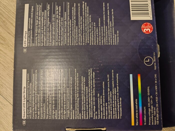 Förpackning för Zigbee LED-slinga, text om smart hem-styrning, 16 miljoner färger, 220-240V, symbol för 3 års garanti, färgspektrum och produktbeskrivning.