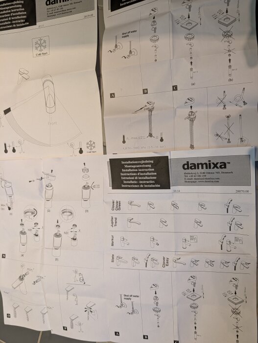 Instruktionsblad med skisser för montering av Damixa-blandare, inklusive detaljerade steg för installation av olika modeller som "Clover Easy" och "Jupiter.