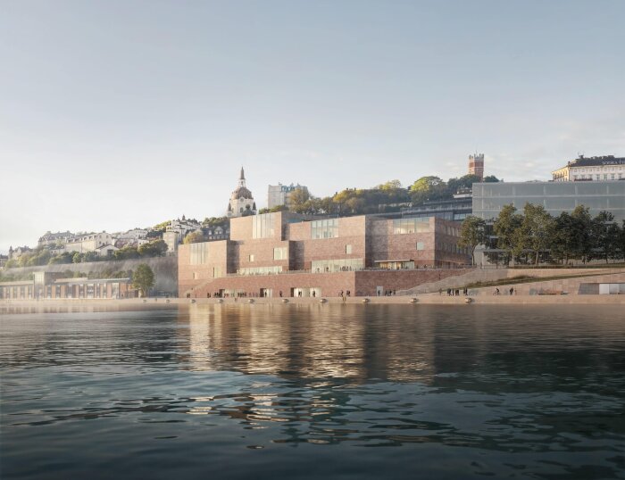 Bild av ett arkitektförslag på Nobel Center vid vattnet, med en byggnad i tegel omgiven av träd och stadssilhuett i bakgrunden.