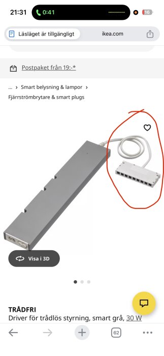 Anslutningsbox och kabel från IKEA Trådfri, för trådlös styrning av belysning. Grå rektangulär enhet med hjärtikon och märkningar.