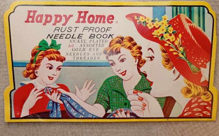En färgglad vintageannons för Happy Home Rust Proof Needle Book med tre kvinnor, varav en visar en blåtygsbit.