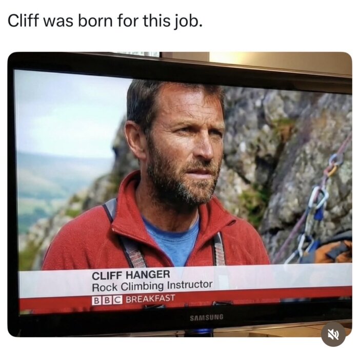 Man på TV-skärm med text "Cliff Hanger, Rock Climbing Instructor" i klättringsmiljö, visar natur och klippa i bakgrunden.