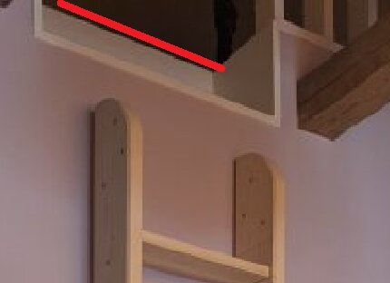 A wooden ladder with flat, slippery steps near a wall, with a red line indicating where to attach a sturdy bar for safer grip during use.