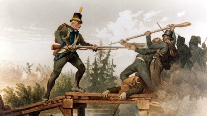 Soldater strider på en bro, en står över en fallen motståndare med vapen riktade mot andra fiender i bakgrunden.